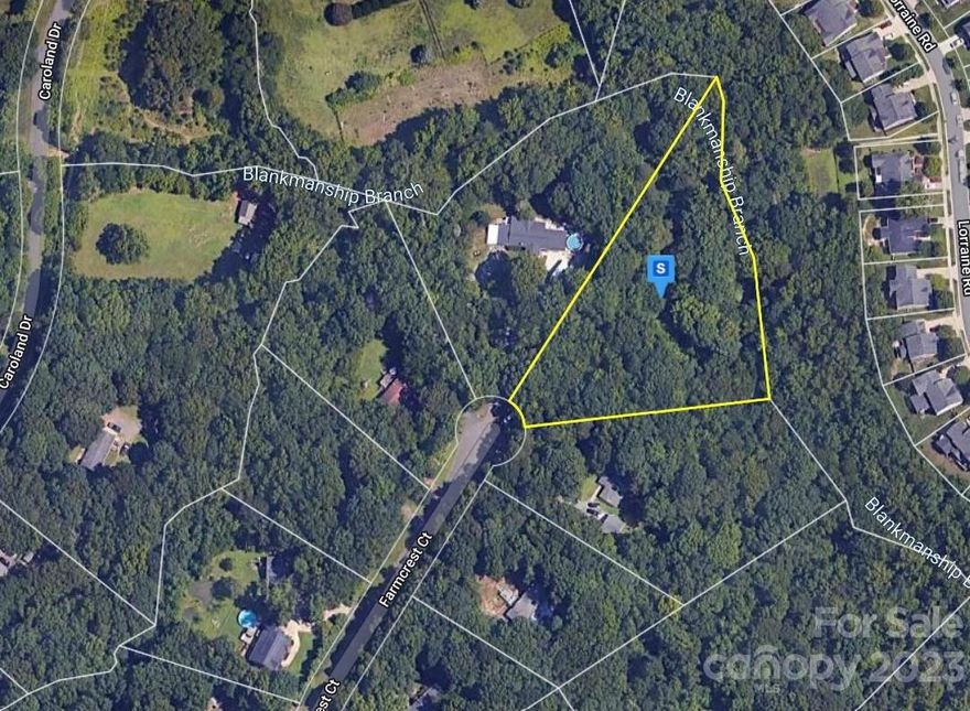 A rare find!! A homesite over 2 acres in the Fort Mill school district for under $110,000!! This wooded homesite at the end of a quiet cul-de-sac has a stream forming the rear lot line of over 450 feet. Lots of beautiful, mature trees. There has been electrical service in the past and there is a well on site; however, the seller is not sure if the well is operable. No HOA or HOA fees. York County regulations apply. Modular homes are allowed. Low York County taxes and an award-winning school system make this an outstanding opportunity to build a home. Located less than 4 miles from Carowinds and easy access to Uptown Charlotte. Shopping, medical facilities, restaurants, and entertainment is only minutes away. The Charlotte Douglas International Airport is less than 30 minutes away. Don't miss this opportunity!!