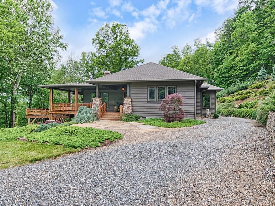 For those who covet privacy, quality and acreage, you have found your pristine new home. The artist retreat sited on acreage is a dream home for those who desire more! Views from most windows of the subtle vista or the woods that cradle this estate! Deep porches, sunny deck and ultimate open floor plan with a main level master and spa bath. Remarkable finishes throughout offering casual elegance. Two Car Carport and detached 2 car garage with Full Studio and extensive Artist Woodworking shop.