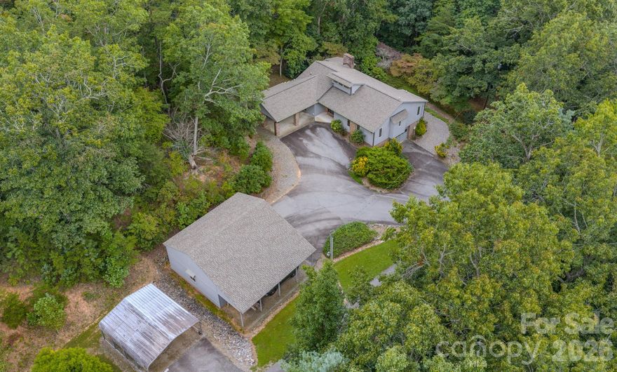 Spacious Home on 6 Acres in Desirable Black Mountain!
 Welcome to this exceptional three-bedroom, two-bath residence set on approximately six private acres in the heart of desirable Black Mountain, North Carolina. Offering over 3,000 square feet of living space, this home combines mountain charm with endless potential.
 The property features a full unfinished basement, ideal for future expansion or ample storage. A detached two-car garage provides additional convenience, while the expansive covered carport attached to the home ensures easy access and extra parking.
 Inside, you’ll find a generous floor plan with comfortable living areas designed for both everyday living and entertaining. The acreage offers room to roam, garden, or simply enjoy the peaceful surroundings that make Black Mountain such a sought-after destination.
 This unique property delivers the perfect balance of space, functionality, and location—an outstanding opportunity for those seeking privacy with proximity to town amenities!