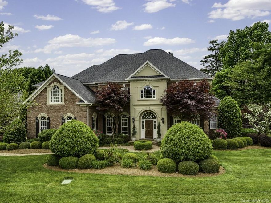 Magnificent waterfront home in The Peninsula on Lake Norman, with views starting at the front door. Gather guests around the large island in the huge gourmet kitchen w/commercial range & dine in the spacious dining room or lakeside on the private dock beneath 20x20 covered gazebo. 1st flr study/living rm, great room with 2-sty stone fpl.  Kit, GR and spacious master suite open to terrace. 4 lg bedrooms up, fabulous lake level features bar, fpl, additional bedroom ste, 2 offices, exercise, media.