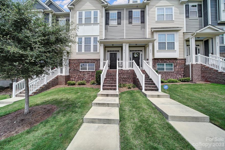 Location! Location! Location! Like New Townhome In Highly Desirable Tega Cay! The Main Level, Stairways and Lower Level Features Hardwood Floors. Spacious Living Room & An Upgraded Chef's Kitchen Which Granite Countertops, Large Island, Breakfast Bar, Grey Subway Tile Backsplash, White Custom Cabinets, SS Appliances, Gas Range, New Microwave & Walk In Pantry. Refrigerator & Washer/Dryer Convey. Large Dining Space Is Open To Kitchen. The Porch Off Of The Kitchen Is Perfect For Grilling. Large Laundry Rm On Main Level. Upstairs You Will Find The Primary Bedroom, Tile Shower & Floor, Double Sinks With Granite Vanity Tops, Walk In Closet, Two Additional Bedrooms And A Full Bath. Lower Level Has Bonus Rm W/Endless Possibilities, Storage Closet & A 2 Car Garage. Entire Interior Of Home Just Painted!  Neighborhood Amenities: Lawn Care, Pool, Playground, Sidewalks & Fireplace Patio Area. Award Winning Schools & Low SC Taxes. Walk To Retail Shops & Restaurants.