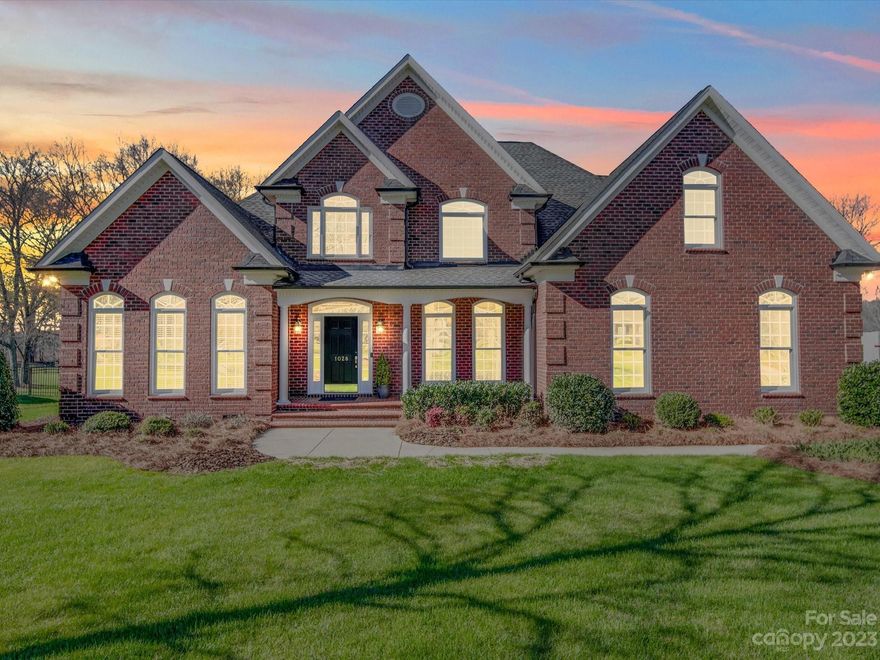 Rarely does an agent have difficulty fitting all of the positive features and attributes of a property in the space allowed, but that is definitely the case here!  The owner personally built this home for his family and pride in ownership shows throughout.  So many of the features you are looking for can be found here, from both the primary AND a secondary bedroom being located on the main floor, to the almost one acre of usable yard space, to the constant updates through the life of home, you will be hard pressed to find anything missing.  Interior updates include tankless water heater, interior painting (2023), new tile work (2021), and the kitchen and hardwoods being redone just a few years ago.  There is also a ton of storage space in the walk-in attic.  Outside you will love the covered back porch with brick paver floor and stained, beaded board ceiling, as well as the cobblestone patio.