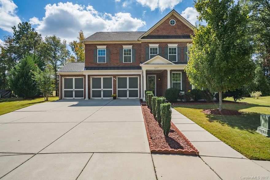 Must see Lake Ridge gem!  Immaculately maintained w/ PRIVATE, flat backyard, tree-lined, cul-de-sac property. Open floor plan w/ new hardwood flooring - guest suite/office on 1st floor w/full bath.  5 bedrooms- 4 bdrms upstairs and a large loft for entertaining/family time. 3 full baths & 1 half.  Large 3 car garage.  Clubhouse, pool, gym, tennis/basketball courts & playground enhance the Lake Ridge/Tega Cay lifestyle. Close to Lake Wylie, shopping, restaurants & award-winning Fort Mill schools.