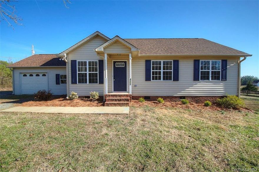 3BR/2BA ranch home with 1.15 acres in the sought after Unionville/Piedmont area of Union County! Updated with new granite counter tops and sinks in kitchen and all baths, new stainless steel appliances, new backsplash, new carpet, fresh paint throughout, updated lighting and hardware. Open floor plan with vaulted ceilings in the living area. 1 car garage, connected to the house via mudroom/breezeway. Large extended deck overlooking spacious backyard. Peaceful country retreat, move in ready!