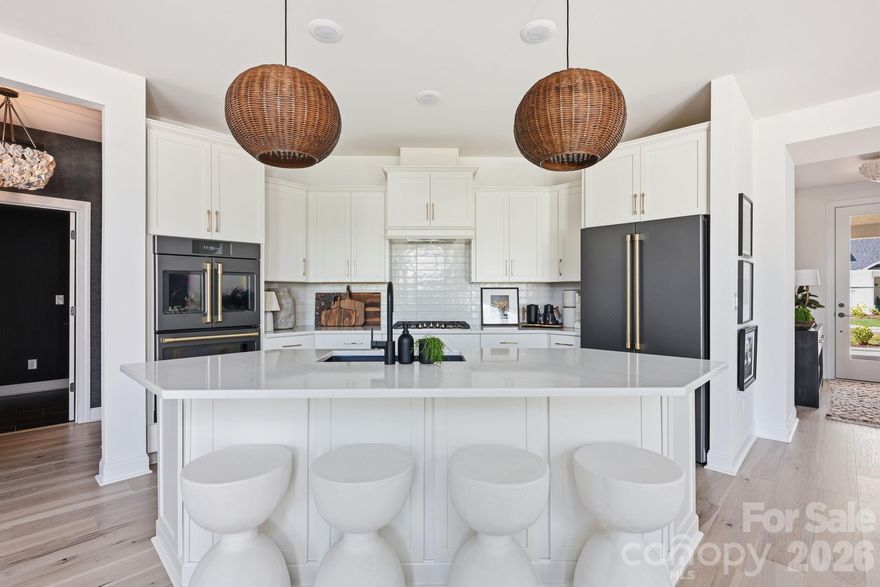 Lake Davidson mornings. Dinner on Main Street. A home that requires nothing of you.
An award-winning interior designer built this as her personal home. This is what she chose for herself. The hardest part of designing a home is making a thousand decisions you're not sure about. She was sure.
Every finish, every fixture, every selection was chosen with intention. The result feels curated rather than constructed.
The open-concept main level flows effortlessly, with natural light, clean sightlines, and a primary suite that never requires a staircase. Two additional bedrooms, three full baths, and 2,568 square feet of thoughtfully designed space — nothing wasted, nothing missing.
The Courtyards at Lake Davidson delivers the lifestyle: resort-style pool, tennis, kayak and paddleboard racks with direct water access, and scenic walking paths, minutes from downtown Davidson's shops and restaurants. The HOA handles the exterior. You handle the living.
Move in now, exactly as designed — no build timeline, no decisions, no waiting. Available fully furnished, exactly as designed. Contact listing agent for details.
55+ community.