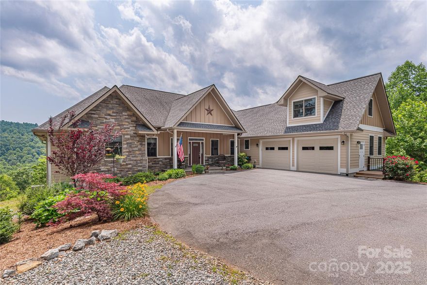 Discover this majestic Saluda retreat, set on nearly 7 acres of pristine land & over 3 acres cleared. Meticulously maintained and thoughtfully upgraded boasting a whole-house generator for peace of mind in any weather, an RV-ready set up with electrical hookups next to the heated detached garage. Garage has it's own propane tank and a mini fridge stocked and ready for hanging out in any season. Soak in BIG mountain views from the expansive back deck made with durable Trex board and a screened-in porch designed for entertaining. Enjoy surround sound speakers around the gas fire as you kick your feet up and enjoy the game or the epic sunsets! With the classic luxury of large rooms, 2 fire places, vaulted ceilings & an updated kitchen with polished granite counter tops, you'll never want to leave. 10 miles to Hendersonville, 20 miles to AVL & Asheville Regional Airport for endless entertainment, fine dining, and outdoor adventures. HOA says Short Term Rentals and goats are allowed. Furniture is negotiable. Do not miss it!