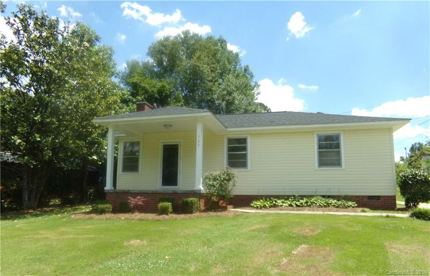 There is no wasted space in this charming bungalow, located in an established neighborhood, near Lancaster amenities!  It features a large living room with hardwood floors, built in office area and fireplace, that leads to the kitchen/dining room combo, with sliding glass door access to rear patio.  The three bedrooms have easy access to the full hall bathroom.  Enjoy sitting on the front covered porch. The paved driveway leads to attached rear storage.  Don't miss this one!  It won't last long.