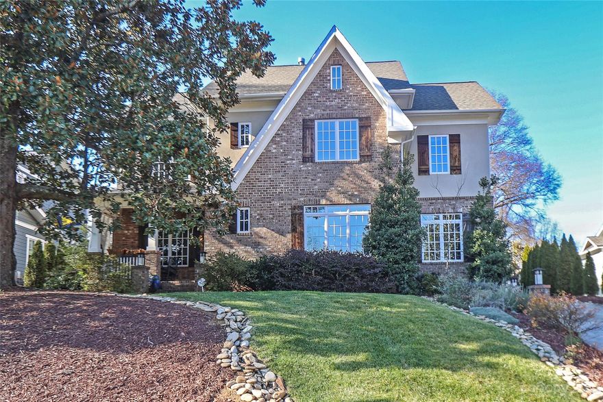 Welcome to 2114 Cumberland Avenue. The 2016 renovation transformed the home into a 3800 square foot gem with well proportioned  rooms, high ceilings, custom millwork and luxury finishes throughout the home. The first floor lives beautifully with an open floor plan that includes formal living and dining spaces, gourmet kitchen anchored by a large island, breakfast/sitting area and family room with a wall of windows that lead out to a stone terrace and private .41 acre rear yard. There is a  a second primary suite, home office and large laundry room also on the main floor.   The second floor boasts a primary bedroom with a 16' vaulted ceiling, stone gas fireplace, reading nook,  spa bath with claw foot tub, oversized shower  and custom closet. There are two additional bedrooms with walk in closets and a shared bath. With 5 bedrooms, 3 full baths, over 3700 square feet of living space on a large lot just steps from Freedom Park and East Blvd., this is the perfect place to call home.