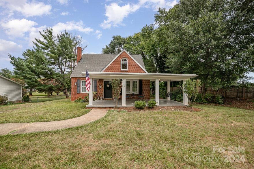 Seller will provide $2,500 towards Closing Costs and a 1yr Home Warranty with Full Price Offer!! Stunning 4-Bedroom, 2-Bathroom Home with Rocking Chair Front Porch. Enjoy the elegance of luxury vinyl plank flooring in the kitchen. Modern kitchen with granite countertops and a cherry wood top island. Admire the vaulted tongue & groove pine ceilings in the 2 bedrooms upstairs. Upstairs has a new heat pump and updated electrical. Downstairs, gas heat with central air. Experience comfort and style in every corner of this beautiful home!