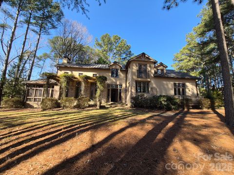 Photo of 177 Yadkin Falls Road, New London, NC 28127 (MLS # 4345902)