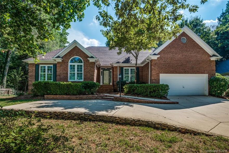 Pristine brick ranch in desirable Cedarfield within walking distance to the greenway. Completely renovated kitchen with new custom soft close cabinets, wide plank tile, granite and custom lighting package. Open floorplan, formal areas, crown moulding / hardwoods throughout, fireplace w/ nice sized bedrooms & Lg Master Suite / bath.  Ext Gardener's shed has electricity. Private backyard has deck & mature landscaping. Roof & HVAC in 2016. All appliances convey! Mins from shops, grocery, I-77/485.