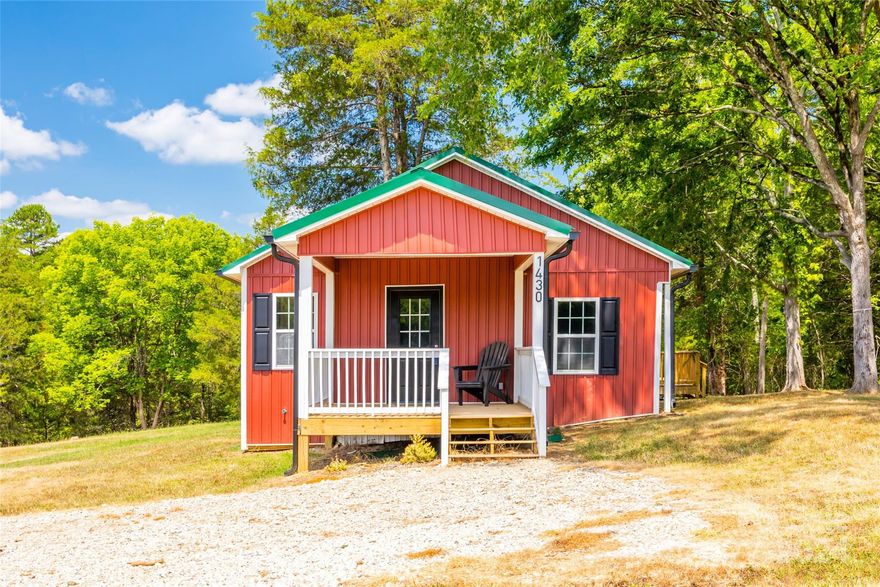 Nestled on over 6 acres of serene countryside, this charming 3-bedroom, 1-bath ranch home offers a tranquil retreat from the bustle of city life. Surrounded by nature, with ample space for hunting and exploring, it beckons as both a weekend getaway and a permanent residence. The property offers freedom—no HOA or restrictions—ideal for riding 4-wheelers and enjoying the outdoors unhindered. Recently renovated, the home features fresh paint, new carpet, modern appliances, and stylish cabinets, ensuring comfort and convenience. A new HVAC system, roof, and siding promise peace of mind for years to come. Outside, a new deck invites relaxation, while a rocking chair front porch exudes Southern charm. With owner financing available, this idyllic retreat presents a rare opportunity to embrace country living at its finest.