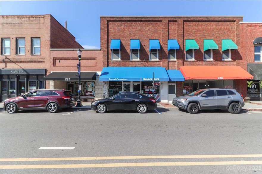 Main Street in Downtown Mooresville within the Social District opportunity! Spectacular location, two story brick building currently has three (3) businesses operating. Endless possibilities with Traditional Downtown T-D zoning that will allow many residential, cultural, community, religious, educational, medical, event venue and commercial applications... back-alley parking spots. Professional measurements coming soon
 Follow this link to learn the history of downtown https://storymaps.arcgis.com/stories/f0a2e3135bda4d91980cb29b9d0e7763.