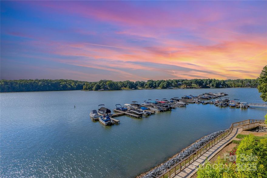 MILLION DOLLAR VIEW!! Looking directly over the main channel and Marina
Welcome to carefree lakefront living on beautiful Lake Wylie! This home offers the perfect blend of comfort, style, and convenience

Step inside to discover an open floor plan designed for relaxed living and entertaining. The kitchen is the heart of the home, with a large island ideal for meal prep or gathering with friends. Updates like new carpet (August 2025), fresh interior paint (August 2025), and upgraded fixtures create a modern, move-in ready feel.

The primary suite is a true retreat, with year around views of the lake also, featuring an oversized fully tiled walk-in shower and a large walk-in closet that adds both luxury and function. The condo conveys a designated boat slip governed by the HOA, giving you direct access to Lake Wylie for boating, fishing, and endless waterfront enjoyment. Imagine mornings with coffee by the water, afternoons spent cruising the lake, and evenings watching the sun set across the shoreline. 
Beyond the lake, you’ll love the prime location—close to dining, shopping, medical facilities, and with quick access to major interstates. Everything you need is within minutes, making lake life as convenient as it is beautiful.

Whether you’re searching for a weekend retreat, a year-round residence, or a smart investment in the waterfront lifestyle, this home delivers it all.
Don’t miss your chance to enjoy the Lake Wylie lifestyle—schedule your private showing today!
 ********SELLER has paid special assessment for 2025**********some photos have been virtual staged