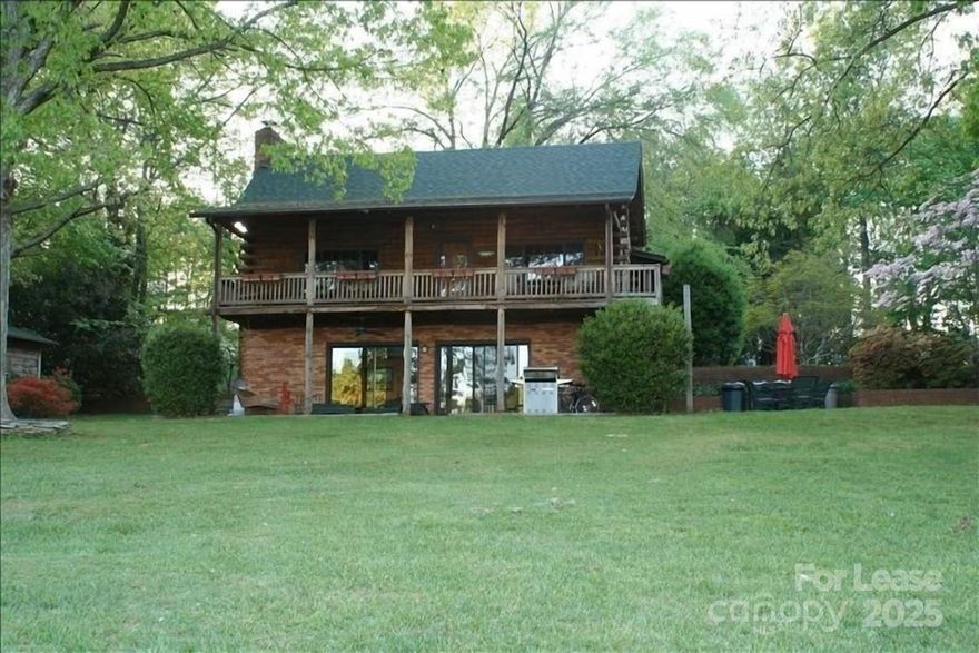 Don't miss out on this 4 bedroom log cabin on the main channel of Lake Norman which offers amazing waterviews.  Available for 2-6 month lease and fully furnished and ready to move in.  Private dock with boat lift.  All utilities and maintenance included in the rent. Interior of this home boasts beautiful woodwork, stone accented walls and fireplaces, and warm ambience throughout. Natural exterior surroundings with special touches such as solar lighting, maintained grounds, extensive patios and fire pit, and wide-open water views.