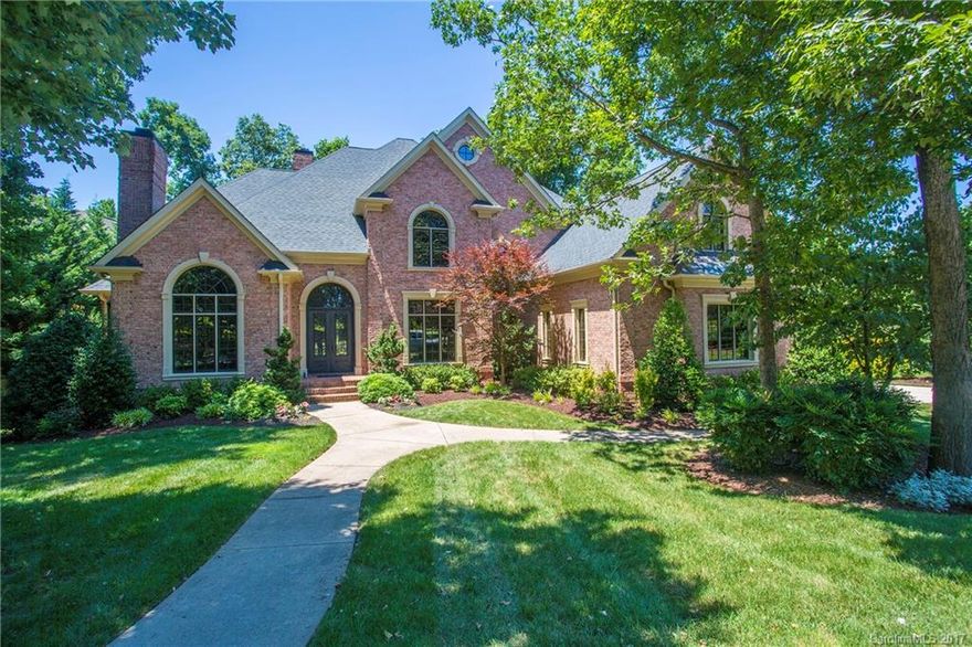 Incredible updated brick waterfront home in The Peninsula with golf course views as well. 5 bedrooms each with its on bath. Master on the main with updated master bath. Updated kitchen with Thermidor gas Rangetop and hood. Walk out lake level with 2nd kitchen/bar, exercise room, rec room, and plenty of room to entertain. 2 story entry and 2 story great room with fireplace. 3 car garage. Located in a premiere part of The Peninsula its just a short drive or walk to the club house.