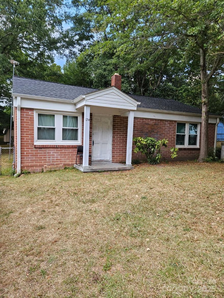 All brick 2 bedroom, 1 bath fixer upper for sale.  Outside offers a beautiful backyard with fencing & storage building, new Champion windows throughout, architectural shingles, covered stoop and located minutes to downtown and by-pass, restaurants and shopping.  Inside offers hardwood floors and is ready for a redo and needs a new HVAC, interior painting and patching, etc.  Sold As-Is.  Could be a doll house!