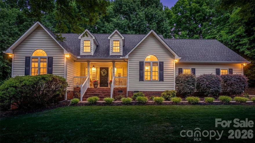 Lake Living! Welcome to this beautifully updated oasis in a quiet lake access community! This home is located on nearly 1 acre in a peaceful cul-de-sac with lots of privacy and tranquility. It includes a community dock with swimming, fishing and kayak access. This home has been beautifully updated with large granite island, gorgeous LVP floors and statement lighting. Primary en suite bedroom has tray ceiling and large walk in closet.
A spacious bonus room over the garage is plumbed for a bar but could be used as flex space or 4th bedroom.
Enjoy coffee on the covered porch while savoring the serenity of nature. Perfect for backyard parties and entertaining! Minutes from Waterside Marina and Long Island Boat Launch. 50 minutes from Charlotte and Charlotte Douglas International Airport.