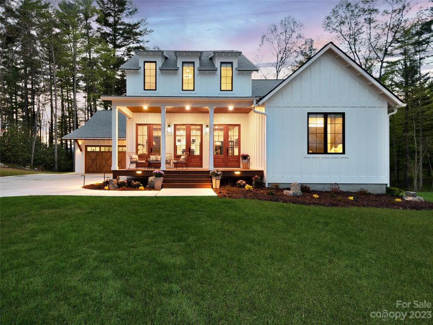 LOCATION! OPULENCE! VIEWS! This modern, luxury, farmhouse style home has the most spectacular mountain views and vibrant sunrises. Situated on 2.64 acres overlooking the prestigious Cane Creek Valley, it's truly a rare gem. This newly built home has unparalleled craftsmanship and intentional design. The 10ft ceilings and huge windows boasts tons of natural light. The gorgeous kitchen features professional Frigidaire appliances, gas stove, large island, and quartz countertops. The open floor plan was created for entertaining while capturing the stunning views. The spacious primary bedroom & bathroom comes complete with a custom walk-in closet, his & hers sinks, glass shower & free-standing soaking tub. Thoughtfulness went into every inch of this elegant 5 bedroom, 4 bath home. The oversized 2 car garage, 2 living areas, wet bar, & home gym provide room for all your favorite hobbies. Sip a drink on one of the covered porches or at the nearby Turgua brewery and soak up the mountain charm.