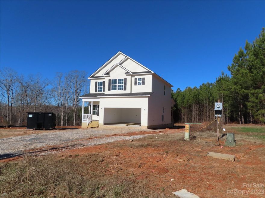 Clover schools but a York address. Wonderful new construction sitting on an acre lot! You can bring your camper or your boat. House should be complete around end of February or the middle of March.
Keeping everyone close by at night will work great as all the bedrooms & the laundry room are upstairs. Downstairs includes the great room, kitchen with granite, eating area & small room for an office or whatever you choose. There is a covered back porch as well.  
Buyers need to verify the elementary school as some schools are at capacity and some students are having to attend other schools.