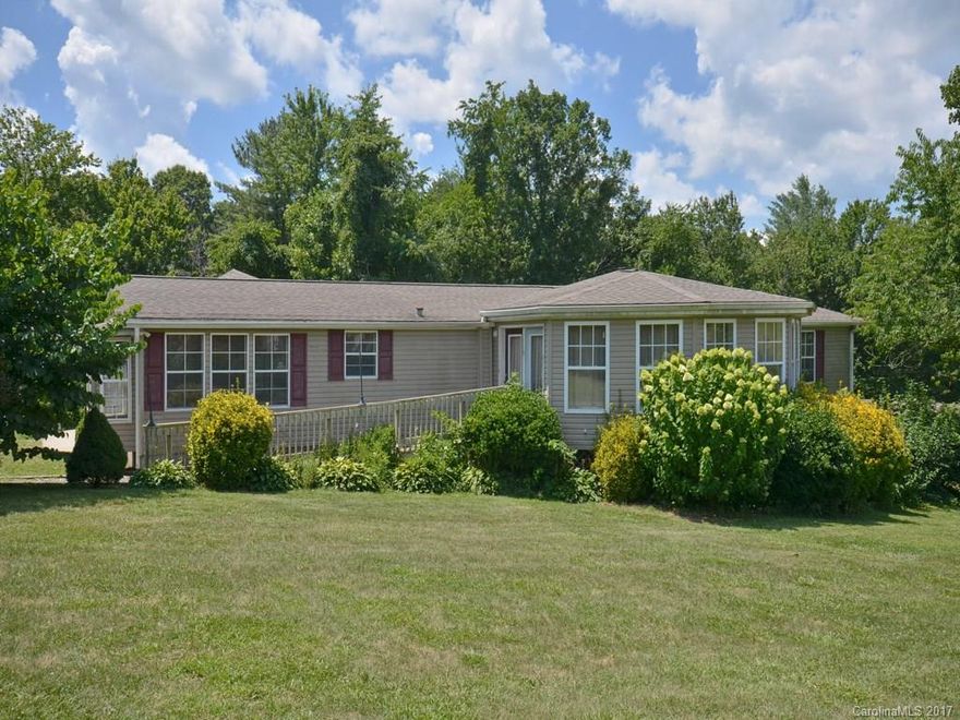 Well maintained home with 3 bedrooms, 2 bath, 2124 sq ft, large glassed in sunroom with hardwood floors, window seating and gas log fireplace. Formal Dining room, great family room area with rock fireplace, & bay window. Kitchen is open and roomy with breakfast area.  Large master br has garden tub. Wheelchair ramp to front door, 2 car attached garage, walk in crawl space. Beautiful, mature landscaping and fenced area for dogs.