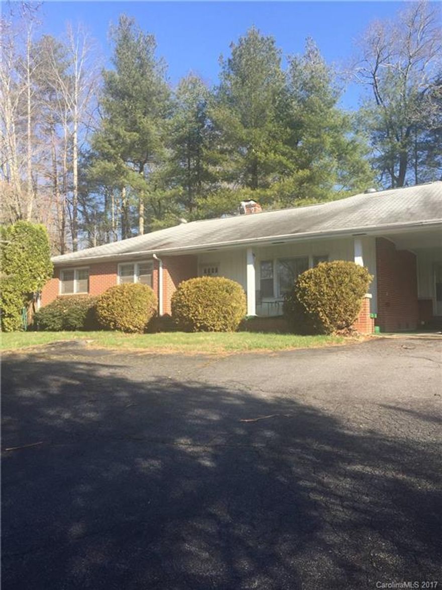 This fixer-upper home is being sold AS-IS. Needs TLC.  Large rooms with lots of built ins, enjoy the year round sunroom with unvented gas fireplace, nice floor plan with attached 2 car carport.  Located on 64E, convenient to schools, churches, fire department, library and small businesses. Also includes pin # 9690691117. (Deed book E-328). (Some furnishings included in sale price).