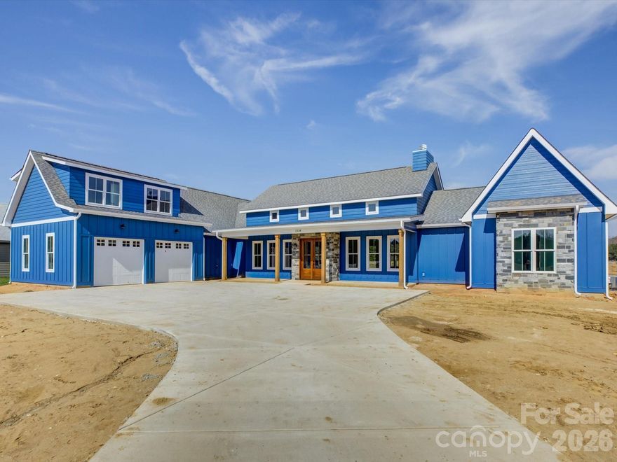 This new construction custom home is a one-of-a-kind opportunity to create a space that fits your lifestyle and budget, with comfort and functionality at the forefront. Buyers added a custom wine cellar, accessible through a hidden trap door in the pantry. A spiral staircase leads down to a thoughtfully designed space with built-in shelving, perfect for storing and showcasing a collection. Lowland Meadows offers 1-acre home sites and 9+ acres of open space, including a large pond, walking trails, and a pavilion. Our design-build capabilities include custom home designing and 3D modeling, allowing you to visualize the finished product and reduce costly changes during construction. Contact us to find out more about the standard quality features found in each home and set up a meeting with the design-builder. Let's make your dream home a reality!