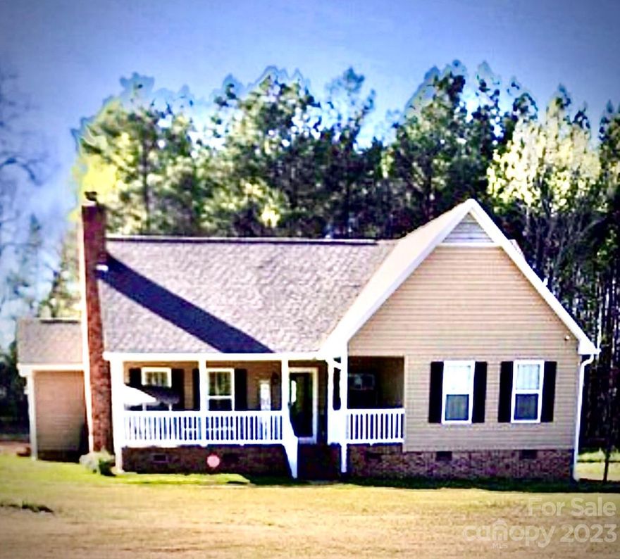 Lovely ranch home sits on 1.6 acres Just awaiting on you! Spacious 3 bed, 3 Full Bath! Vaulted Ceiling with brick gas log fireplace, Spacious Kitchen with tile flooring, tiled back splash, granite countertops and plenty of cabinets for perfect storage. Stainless Dishwasher, Range and Over the range Microwave to convey as is.
Main Bedroom has added office/flex space with a tiled ensuite that leads to screened back porch perfect for morning coffee or evening relaxation.(Please Note, unpermitted addition built by Home Owners. Has 2 storage buildings convey as is or can remove) covered front porch and  
fenced back yard.  Lewisville schools- Great Neighborhood & Location close to Chester, Richburg Restaurants and I77!!!