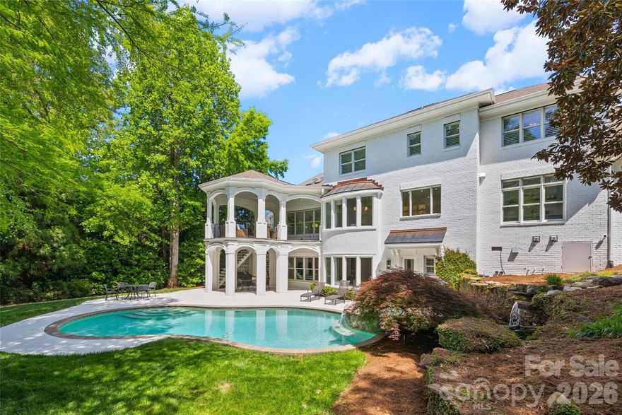 Rare opportunity to own a completely renovated home situated on a quiet 0.48 acre cul-de-sac lot in the beautifully established Ballantyne Country Club community. The work has been done so you can simply move in and enjoy this stunning updated home and resort style outdoor living space. This home underwent an 11 month “to the studs” renovation finished in 2024 that included new electrical wiring, new plumbing pipes, and new interior insulation in 80% of the house. The thoughtful redesign and addition resulted in a nearly 7,000 square foot home with a large chef’s kitchen, 2 pantry closets, scullery, luxurious primary suite with two large custom closets and two vanities, three additional bedrooms with en suite baths, a large office, 5 full baths, 1 half bath, bonus room, craft room (or potential upstairs laundry), gym and second kitchen in the basement, and a large porch by the main kitchen. New high end finishes throughout the entire home including all cabinetry, countertops, appliances, tile, plumbing fixtures, frameless shower enclosures, mirrors, lighting, stairs, handrails, solid core interior doors, door hardware, custom closets, and site finished 5” white oak floors on entire first and second levels. The outdoor living space with custom built pond and waterfall has been updated with new landscape lighting, resort like pool with new pump, new controller, new sand filter, new plumbing, and an irrigation system with new lines. Built by Arcadia Homes, the brick home features 10’ ceilings with 8’ tall doors on the main level and in the basement, and 9’ ceilings on the 2nd level. The expansive living areas both inside and out are ideal for entertaining and family gatherings. Natural light fills the home  morning and afternoon providing a beautiful bright and airy setting all day. Located in sought after Ballantyne with top rated schools and convenient access BCC amenities, shopping, and The Bowl at Ballantyne. You will not want to miss this amazing opportunity - prepare to be impressed!!