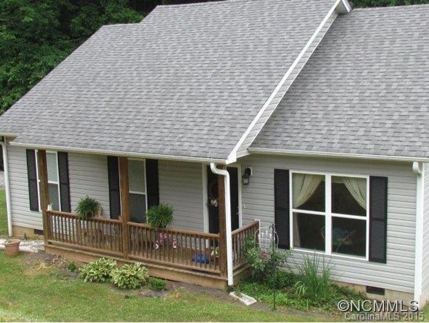Location, location, location!!! Private setting but only 3 minutes to Downtown Weaverville. 2 minutes to I-26, 15 minutes to Downtown Asheville. Enjoy this 5 year old home that is move in ready. Open concept and 9' ceilings give the feel of this home being much larger. Rocking chair front porch. Small stream in back. Large windows give lots of light. Fantastic kitchen with all stainless appliances. This is a must see for this price! Site built!