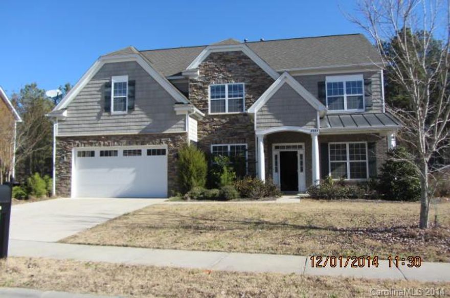 Spacious lot. Former model home. Huge kitchen with granite counters and SS appliances. 5 bedrooms and a bonus. Guest bedroom on the 1st floor. Mud room off garage. Private back yard. Well landscaped. Hardwood floors in the foyer, dining room, living room and kitchen. Some custom window coverings remain. Lancaster address, but IndianLand Schools.