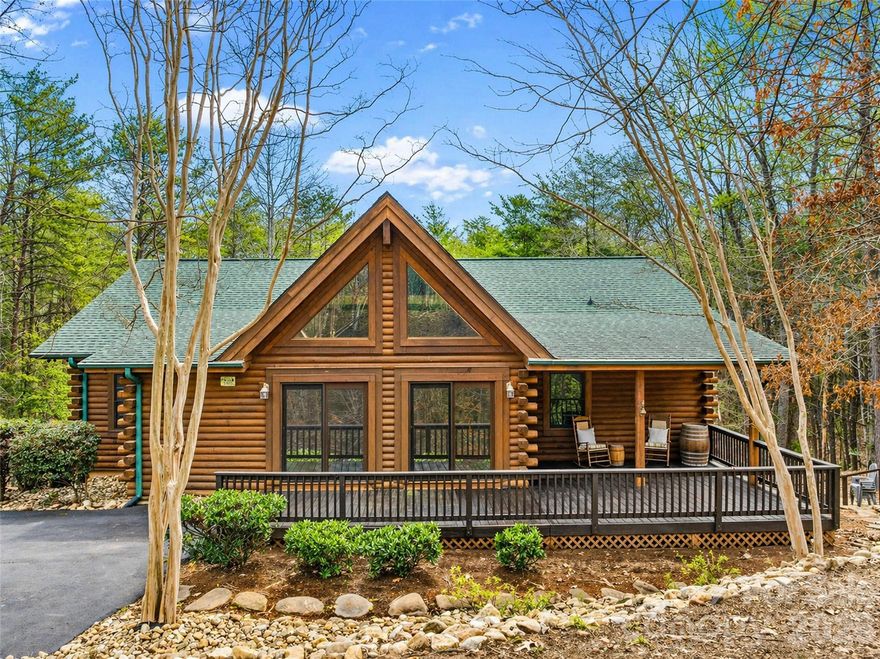 Nestled  in the sought-after Shumont Estates of Lake Lure, this crafted log home offers 3, 724 +/- square feet of heated living space and is being sold furnished for a truly turnkey opportunity. Designed for comfort and convenience, all bedrooms are located on the main level, including a spacious primary suite featuring gas log fireplace, walk-in closet, linen closet, and private bath. The inviting living rom is accented with gas logs and rich wood details, creating a warm mountain lodge ambiance. The kitchen features vaulted wood ceilings and flows into the dining area, perfect for gathering and entertaining. The lower level provides additional living space with a family and entertainment room, recreation room, full bathroom, laundry room and multiple storage closets. Ideal for guests, game nights, or extended stays. Surrounded by the natural beauty of Rumbling Bald and the area of Lake Lure, this furnished log home is well-suited as a full-time residence, vacation retreat, or investment property. (Some furniture items are staged items which are not included in the sale of the home)