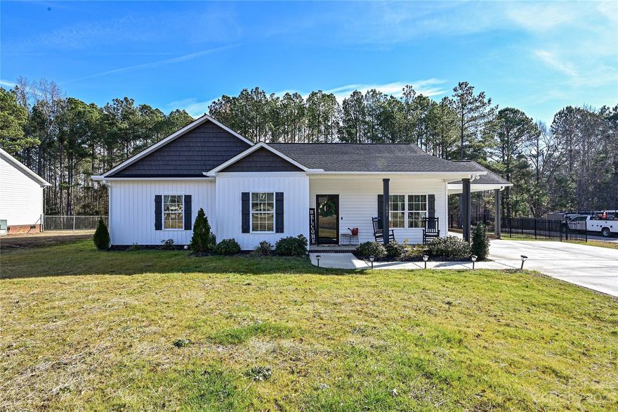Only two years old, this wonderful three bedroom two bath ranch is in immaculate condition. The owners bought an undeniably pretty house and quickly turned it into a beautiful home. Great curb appeal, large fenced back yard.  The black aluminum fence recently added by sellers provides such an appealing balance to white tones of home and serves a great benefit for those with children and or pets. Yards recently resod.  Inside, an open floor plan and the many upscale features and finishes may surprise you.  LVP flooring throughout. Spacious and beautiful, open kitchen/den areas are great for entertaining.  Roomy primary bedroom. En suite primary bath offers double vanity.  Second and third bedrooms are smaller but quite charming. Hall bath convenient for guests and for second and third bedrooms.  Laundry closet. Corner lot.  Adjacent quiet side street.

Sellers have loved this home but need more space.

SELLERS REQUEST ALL OFFERS BE SUBMITTED BY TUESDAY, FEBRUARY 6 AT 12:00 NOON!