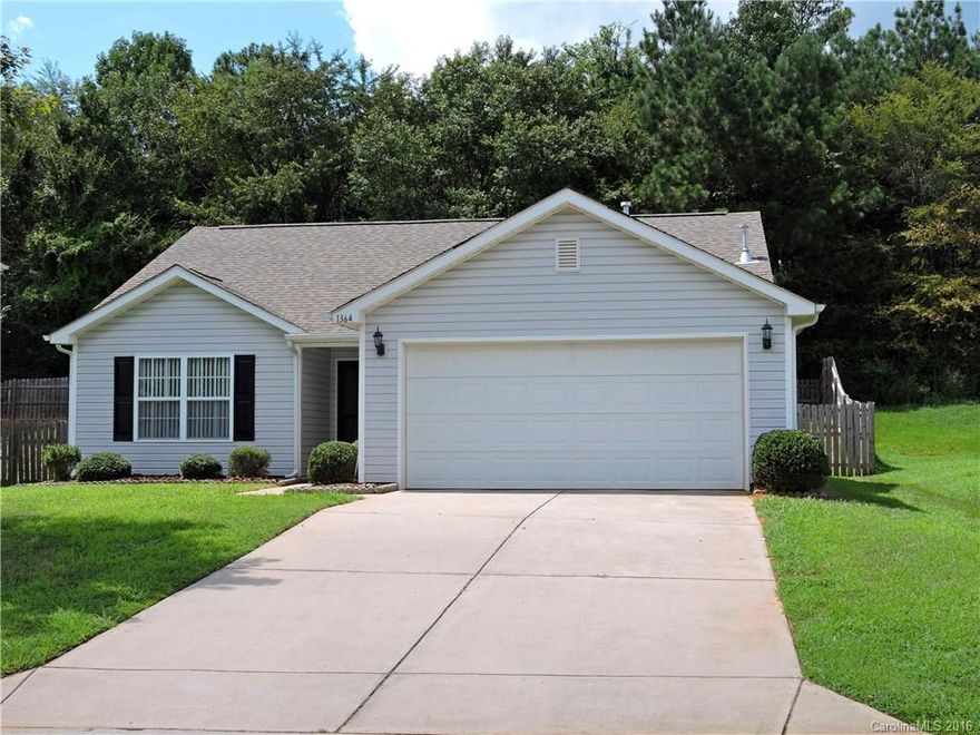 Nice 3BR/2BA ranch w split bedroom floorplan & two car garage. New roof 2014. Vaulted ceiling in living room & Kit. Large laundry room. All appliances remain. Ceramic tile floors in foyer, living room, kitchen, & bedroom 2. All bedrooms have walk-in closets. Backyard has privacy fence, patio, & bonus deck at the back overlooking the backyard.