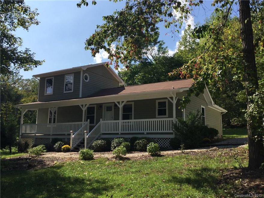 Back on market & reduced! Situated on 1/2 ac with awesome water views, this farmhouse style home has charm, & great curb appeal.  Covered porch runs length of house.  Recently remodeled w/chair molding throughout, beadboard, bamboo floors, newly carpeted master, new HVAC, & new single-hung windows. New kitchen includes ss appliances, glass tile backsplash & granite countertops. Detached 2-car garage plus add'l spaces to park.  Well maintained lakefront neighborhood with no HOA.