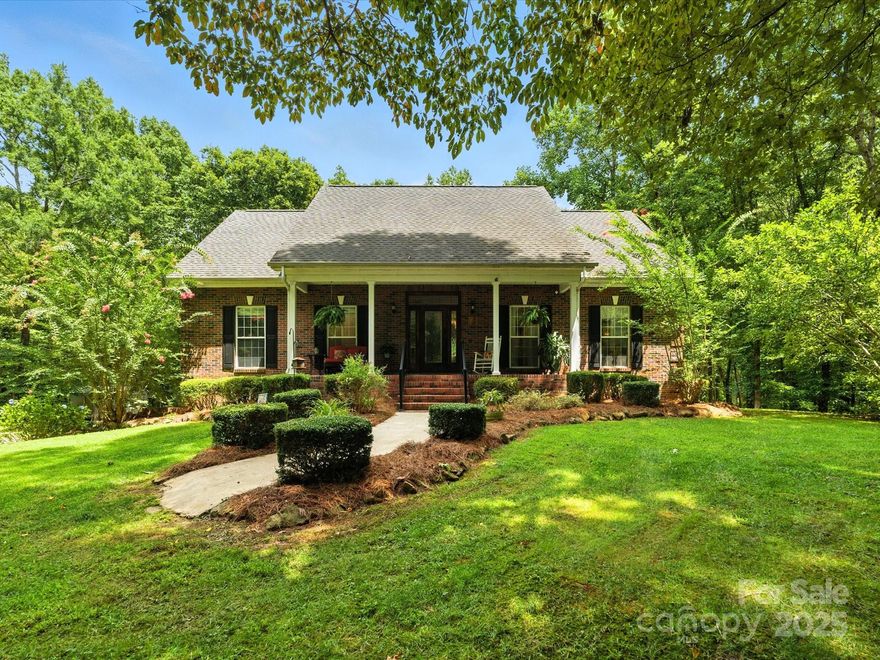 This beautifully updated home offers the perfect blend of comfort, style, and functionality on over 5 acres of peaceful land. Step onto the spacious tiled front porch and take in the serene views—an ideal spot for morning coffee or evening relaxation. Inside, the freshly painted main level features rich hardwood floors throughout the living room and bedrooms, creating a warm and inviting atmosphere. The primary suite is a true retreat, showcasing elegant barn doors, a generous walk-in closet with new shelving, and a luxurious bathroom adorned with marble, porcelain, and tile finishes. The zero-entry oversized shower and custom cabinetry add a spa-like touch.
The kitchen is designed for both beauty and practicality, boasting a new flattop stove, tile backsplash and flooring, upgraded granite countertops, and custom cabinetry. Adjacent to the kitchen, you'll find both a formal dining room and a cozy breakfast area, perfect for entertaining or casual meals. A recently added half-bath on the main floor features a stylish tiled accent wall and flooring.
Upstairs, two spacious bedrooms offer plenty of natural light and comfort, along with a full guest bathroom and a convenient linen closet. The finished walk-out basement adds over 900 square feet of versatile living space, including a full bathroom and a dedicated laundry room.
Outdoor living is just as impressive, with a 12x24 Trex deck ideal for gatherings, a flat backyard for play or gardening, and a fenced garden ready for your green thumb. Additional features include a fire pit, storage shed, and ample space to roam and enjoy nature. Whether you're hosting friends or enjoying quiet moments, this property provides the perfect backdrop for relaxation and outdoor enjoyment.