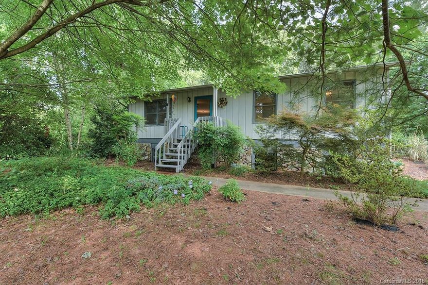 Affordable home in a popular neighborhood close to Lake Junaluska & Waynesville! Priced below the current average sales price in the county, this home offers a big bang for the buck. Sitting on a private, landscaped, fenced lot the home has a special charm. Home features pine floors in the living room & kitchen, functional kitchen with breakfast bar, & 3 bedrooms on the main level. Full basement with over 200 sq ft finished room & 1 car garage. Back deck offers private outdoor area to relax!