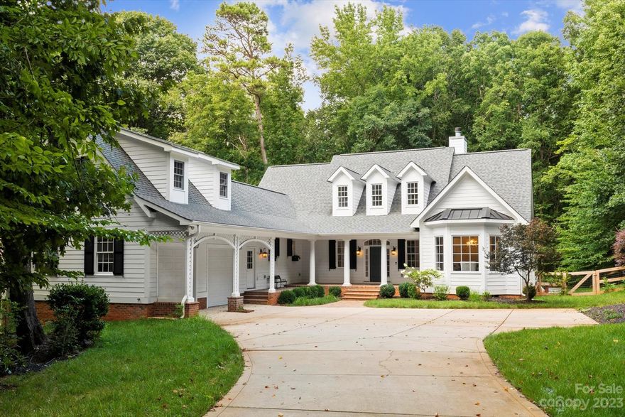 Welcome to the charming home of 9417 White Hemlock nestled on 1+ acre wooded lot. This beautifully designed home offers a perfect blend of elegance, comfort, & modern living. New interior painting & fresh new upgrades. Custom designed renovations completed in late 2022 are perfectly executed. Full kitchen redesign w/GE Monogram range, Jenn-air fridge, Quartzite counter tops & backsplash slabs, gorgeous cabinets loaded w/ built-in features, walnut topped island prep/cutting area, cedar ceiling, scullery w/add'l dishwasher, sink, huge custom lockers w/storage galore. Custom bar w/beverage center & renovated fireplace surround w/floating shelving added to living room. Hardwoods added throughout the entire home, fenced backyard, 2nd floor A/C replaced in 2021. Screened porch w/vaulted ceiling, wood burning fireplace. Add'l square footage contains a finished walk up bonus/rec room above garage is currently configured w/conditioned wine storage that doubles as a private home office space.