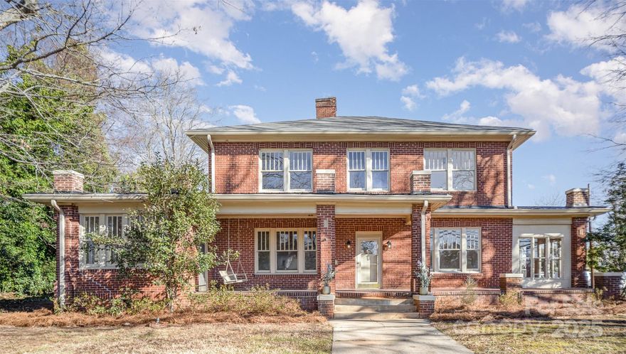 Step into history in Monroe's expanded historic district! This charming home welcomes you with its timeless character. Full brick exterior, real wood flooring and new paint in 2024. One of the many highlights is the sunroom with brand new tile flooring and tons of natural light. This home offers ample storage with cedar closets in all bedrooms. The large, covered front porch, enclosed side porch or the patio are all perfect for relaxing. Detailed trim work and light fixtures instill elegance. In addition, the new HVAC units, furnace and heat pump, and completely redone ductwork and vents promise efficiency.  Crawl space work included structural upgrades, new vapor barrier, new automatic water pump, new hot water heater and new stair rail. Transferable termite bond in place. With just a 5 minute walk to Monroe's revitalized downtown and 3 miles to the 74-bypass, this home offers the ambiance of a historic neighborhood with easy access to modern amenities like dining and retail.