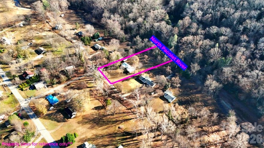 Discover the magic of riverfront living at 109 Wall Road—your cozy, cottage perched along the beautiful North Pacolet River. Tucked just outside Tryon city limits, this home gives you the best of both worlds: peaceful privacy, lower taxes, and that “away from it all” feeling… all while being minutes from town, shopping, dining, equestrian attractions, and the conveniences of both Western North Carolina and Upstate South Carolina.

The real showstopper is out back!!!! Prop your feet up on the lawn, sip your morning coffee, and let the soothing sound of the North Pacolet River wash over you. Whether you’re unwinding after a long day, hosting friends, or simply taking a breath, this yard is the kind of quiet sanctuary buyers search everywhere to find. It’s the lifestyle people dream about—but rarely get to enjoy daily. Step inside this charming ~1200 sq ft cottage (+ Non-HLA is the sunroom with 150+ sq ft; you can utilize!!!) and feel instantly welcomed. The layout offers comfortable living spaces, warm natural light, and the kind of character you just can’t replicate. 

The location couldn’t be more ideal. You’re just moments to downtown Tryon’s charming shops and restaurants, and minutes to all the amenities of Columbus, Landrum, and the entire Upstate SC corridor. Tryon International Equestrian Center, endless hiking, boutique wineries, farm-to-table dining, arts, live music, equestrian events, and mountain adventures are all within easy reach. Asheville, Greenville, Spartanburg, Lake Lure, and the Blue Ridge Parkway are comfortable day trips, giving you access to every corner of WNC and the Upstate.

If you’ve been searching for a full-time residence, mountain getaway, or easy investment in a growing area, this is one you don’t want to let slip by. The combination of location, riverfront serenity, and Tryon’s vibrant lifestyle make 109 Wall Road a standout opportunity.

Come experience it for yourself—you’ll understand the moment you hear the river!

This home also offers peace of mind. A previous appraisal—completed over a year ago—came in at $250,000, and, while the back yard is partially located in a flood zone, the property has no known damage from the 2024 hurricane, providing confidence and stability during a time when riverfront properties are more sought-after than ever. 
****Homes like this—RIVERFRONT, close to town, well-maintained through the years, and with this kind of charm—simply don’t come around often!!!!****