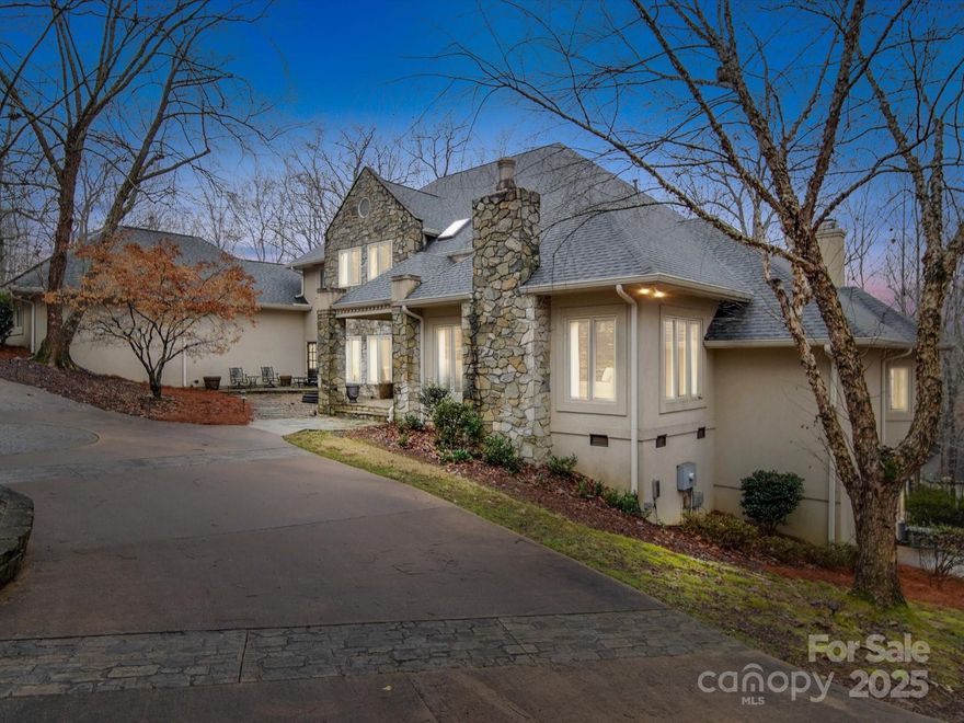 This impressive custom home in the gated Cramer Mountain community is known as the Loomis Fargo heist property! First impressions are everything with the circular drive, stone front, 4 car garage & professional landscape. The driveway leads to a wrap around 2 story deck overlooking a private fenced back yard.  As you enter the grand foyer with circular staircase your attention is drawn to the views out the glass doors.  This home is made for entertaining with open concept; the foyer connects the large dining room, study with the first of many fireplaces and the primary suite. The main suite has a two sided fireplace connecting it to the breathtaking spa-like bath. The kitchen is a chefs dream! 2 large islands, a butlers prep area & walk in pantry.  Kitchen is open to the great room with 2 story stone fireplace & French doors to the deck.  The lower level has ample flex space w a full bar area, walk in wine room, full bath, office and bedroom!  The upper level boast a 2nd primary suite!