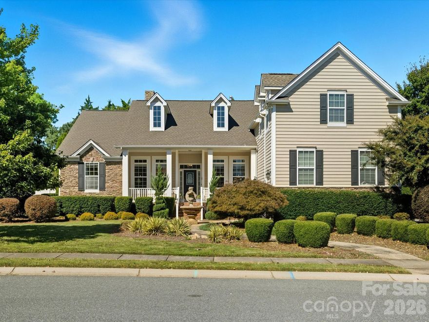 Welcome to Your Dream Home in The Parks!  The Original Model Home for the Neighborhood, this Wonderful 5BR/5BA Open Floorplan has It All!  Beautifully Landscaped, Designed for Comfort, Functionality & Perfect for Entertaining!   The main level features the primary suite & 3 additional bedrooms, an open and airy layout w/11' ceilings & lots of natural light, spacious formal dining room with tray ceilings & dedicated home office. The great room offers, hardwood floors, centered around a stunning stone gas log fireplace with built-ins!   The well-appointed kitchen features an island, granite counters, ceramic tiled backsplash, walk-in pantry, SS appliances to include double ovens & a cozy breakfast nook!  Upstairs, you'll find a large bonus room with its own full bath, plus a 5th bedroom—also complete with a full bath, ideal for guests.  Step outside to an amazing private backyard oasis, featuring a large covered deck, pergola covering the built-in kitchen with a gas grill. fire pit with built-in seating, gorgeous gardens & putting green!  Additional features include: crown molding & wainscoting, a fantastic inside/outside Denon surround sound system, full-yard irrigation, encapsulated/conditioned crawl space, new HVAC, new roof, new gas fireplace insert, new aluminum fencing, an oversized sideload garage w/extended driveway for extra parking & much more!  Don't miss this opportunity to own this exceptional home, in one of Rock Hill's most desirable communities.  Adjacent to York Prep Academy (Nationally Ranked Blue Ribbon School), minutes to shopping, restaurants & more!