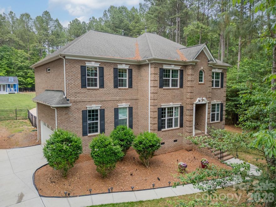 Beware, this home will ruin all your vacations! You will never want to leave this resort style private back yard and the views from the owner's suite every morning! Welcome to your own private Lake Norman retreat in beautiful Troutman, NC! Sitting on over an acre with lake views, this 5 bedroom, 4.5 bath home brings together luxury, space, and the kind of backyard made for peace & relaxation. With over 3,400 square feet, there’s room for everyone to spread out while still feeling warm and inviting. Inside you’ll find an open concept living room with fireplace, beautiful kitchen with island and breakfast area, half bath, private dining room, and formal living/office/or playroom area. Also on the main level, a private guest/in-law suite with full bath. Upstairs you will find a loft area currently serving as a home theater, a spacious primary suite with ensuite bath, dual vanities, and an oversized closet. Each bedroom thoughtfully laid out, bedrooms 3 & 4 with Jack and Jill bath and bedroom 5 with its own dedicated bathroom. The heated saltwater pool, hot tub, oversized patio, mature trees, and the sound of nature create the ultimate backyard oasis with serious staycation vibes... you will never want to leave! There are also friendly deer that make a visit! Whole home generator incase power goes out that instantly switches over. There’s also a spacious two-car garage, oversized driveway with plenty of parking, and a detached tiny home/storage building with endless possibilities.

If you’ve been searching for a lifestyle like this in Lake Norman, this Troutman gem checks all the boxes. Schedule your showing today, homes like this don't last long.