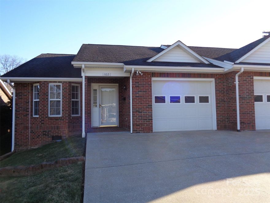 Loking for a great new place to call home!? This extra nice easy access townhome may be the perfect place for you! Conveniently located in historic downtown, the home has an attractive open kitchen/dining /living room floor plan with vaulted ceiling. Throughout the home there is carpet and hardwood on the floors. The kitchen features good cabinetry, a hall pantry and appliances including a natural gas range . The living and dining area share a gas fireploace and have a patio door that goes out to a backyard screened porch. The primary bedroom has a double window and  larger bath with long vanity,  tub/shower and linen closet. The second bedroom currently serves as a combination study/ BR w/double closet. Additional BA has a vanity & shower. Single car garage has attic access. Wonderful location behind post office and close to so many amenities including dining, shopping and entertainment.
***HP replaced in 2024