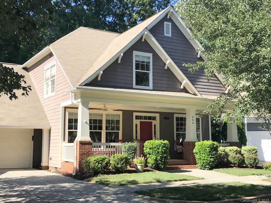 2ND BEST LOCATION IN THE NEW NEIGHBORHOOD/OLD DAVIDSON. Large lot backing up to acres of mature woods. 99 ft wide back yard. House is gorgeous inside..Professional decor flows throughout with custom colors, woven shades,valences,and hardwood oak floors. 2nd floor loft ovelooking 2 story family room. 9 ft windows line the back 0f home facing woods. 150 sq ft of walk-in storage on 2nd floor. 5 ft door walk-in storage in crawl space for all the lawn equipment/garage type storage you need.