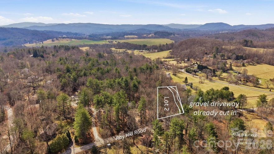 Build your dream home on this beautiful parcel offering nearly 200 feet of road frontage on Ray Hill Road and a head start on the building process. Much of the groundwork has already been completed, including a recent survey, a soil scientist–prepared septic permit for a 3-bedroom home, and useable site plans, allowing you to move forward with confidence.

The property features a road already cut in and multiple buildable areas with flat and gently sloping terrain— actually buildable and actually a gentle slop — the kind of lot that’s actually usable without the extreme site work many mountain properties require. Depending on your home design, you may enjoy views of the neighboring pond and surrounding mountains, creating a peaceful and scenic setting.

Conveniently located just 15 minutes to Hendersonville, 20 minutes to Brevard, and 30 minutes to Asheville, this property offers the perfect balance of privacy and accessibility. Placed in the desirable West,Rugby,Mills River school district!

Restrictions are light and flexible (1,000 sq. ft. minimum home size, chickens allowed—no roosters), giving you freedom to create the property you want without the tight constraints of an HOA. 

For a closer look at the homesite, septic layout, and lot lines, be sure to view the video tour. Use 227 Ray Hill Road for general GPS guidance, and we recommend using LandGlide or similar alongside the new survey when visiting the property.

Please contact agent before walking the property. There's another 1-acre parcel nearby available: MLS: 4354246