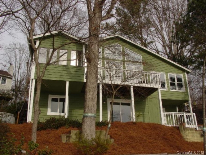 Freshly painted. Ready to move in. Enjoy lake front living. Large docks, jet ski lift, patio, decking. Main water channel