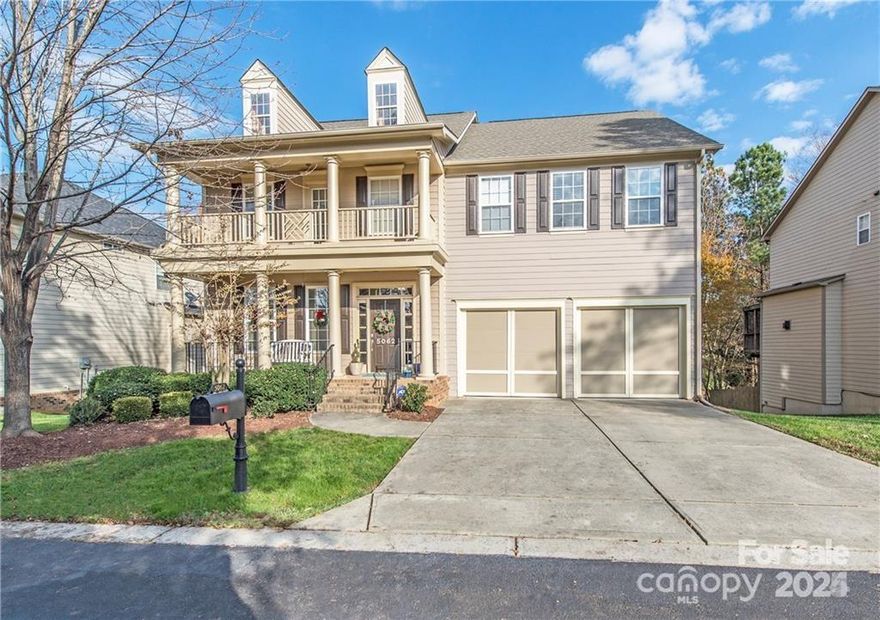 Charming Charleston style home on the South Carolina side of the Bridgehampton neighborhood. This beautifully updated home features an open layout perfect for gatherings. A chef's dream kitchen featuring white cabinets, neutral counters and a stainless steel appliance package. A center island allows for extra prep space and seating along with an adjacent breakfast area with bay window and access to the screened porch. The family room offers a gas fireplace flanked by built-ins. Head upstairs to find an oversized primary suite with trey ceilings and spacious ensuite with tub and separate shower plus dual walk-in closets. Three additional bedrooms, two share a Jack-n-Jill bath. Additional loft space allows for creative gathering or office space. Screened porch overlooks woodsy rear yard. An unfinished basement allows for additional storage. Bridgehampton offers abundant recreation and amenities. Great location close to abundant shopping and dining.