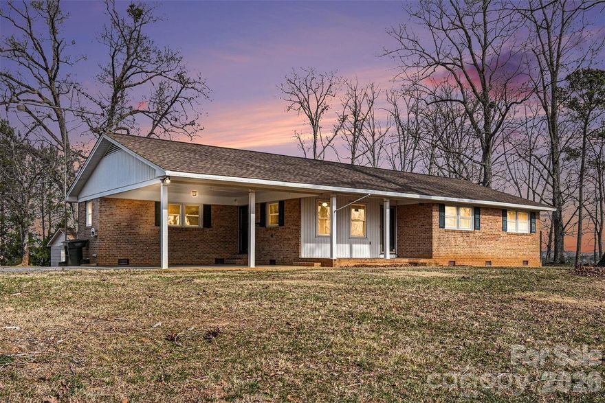 Enjoy seasonal mountain views while remaining close to local restaurants, with easy access to I-85 and just 6.5 miles from the casino, making daily commuting and entertainment convenient. Set on a 0.68-acre lot, this well-maintained 3-bedroom, 2-bath home offers a desirable combination of land, storage, and convenience. Built in 1973, the home features a functional layout with comfortable living spaces and timeless character. The property includes an attached two-car carport, along with two large storage buildings both have electricity! There is an additional smaller storage building, providing exceptional flexibility for hobbies, equipment, workshops, or additional storage.