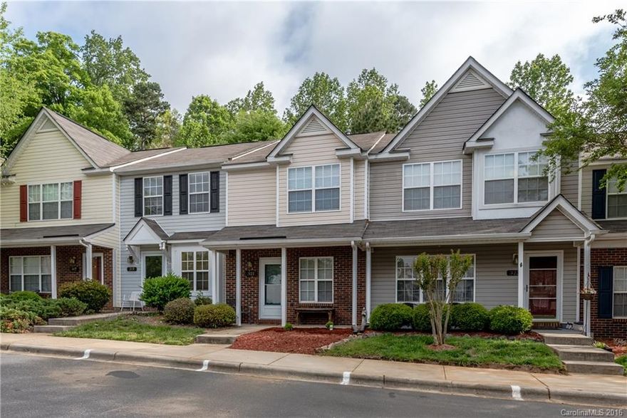 Covered front porch & new front door w/ storm door invites you inside. Newly painted interior! Kitchen features bar seating, recessed lighting, & smooth top range! Great room has corner gas log fire place, ceiling fan, and access to the patio which backs to trees!  Out back there is also a storage closet!  Upstairs the dual masters feature vaulted ceilings and private baths. This pool community is convenient to I-77 & Riverwalk! Fort Mill Schools!